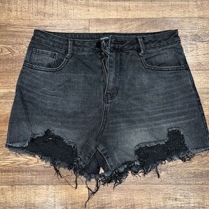 Black denim shorts with some stretch. Great condition.